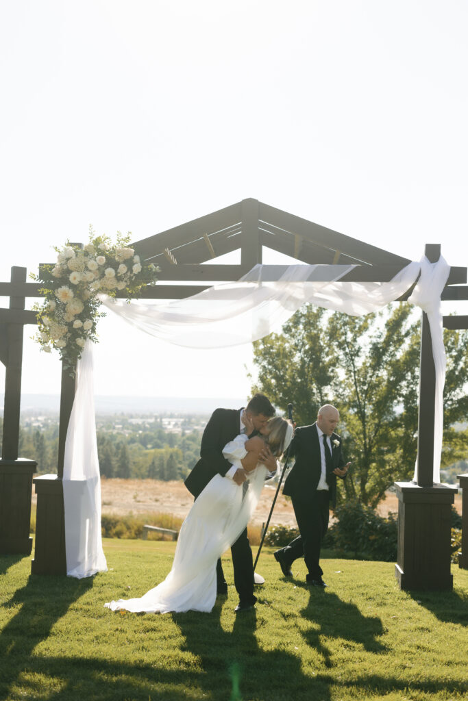 bride and groom kissing 