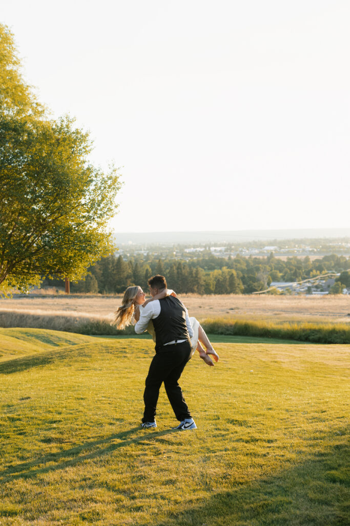 bride and groom dancing at beacon hill at sunset