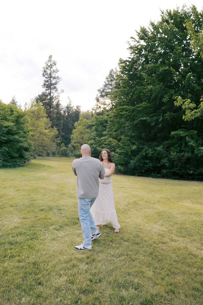 couple laughing Finch Arboretum engagement session Spokane
